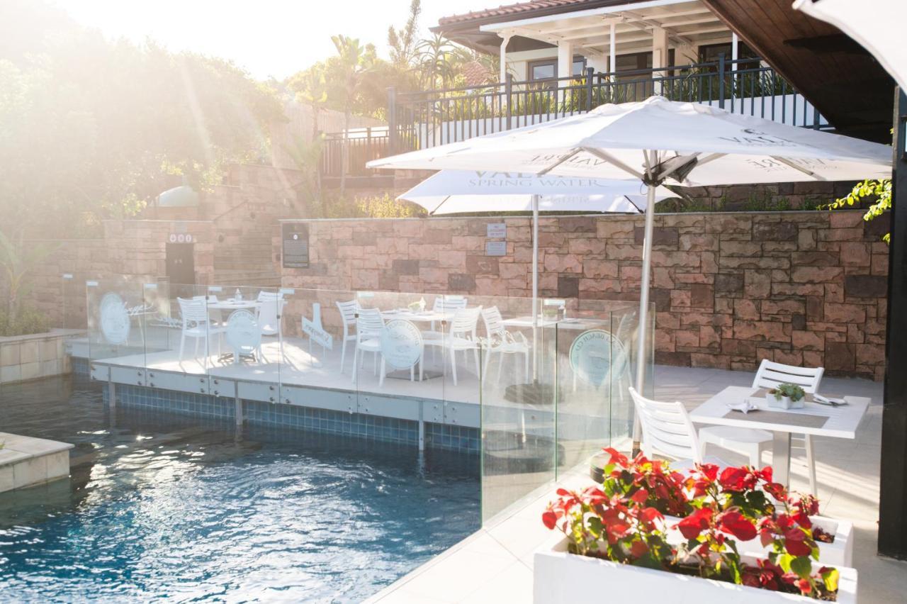 The Capital Zimbali Hotel Ballito Exterior photo The pool at the hotel