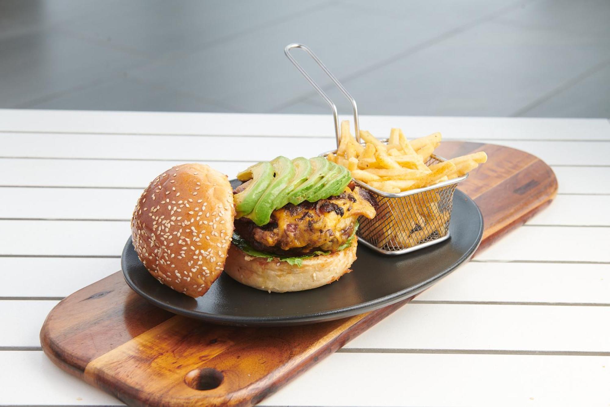The Capital Zimbali Hotel Ballito Exterior photo A vegan burger with avocado and chips