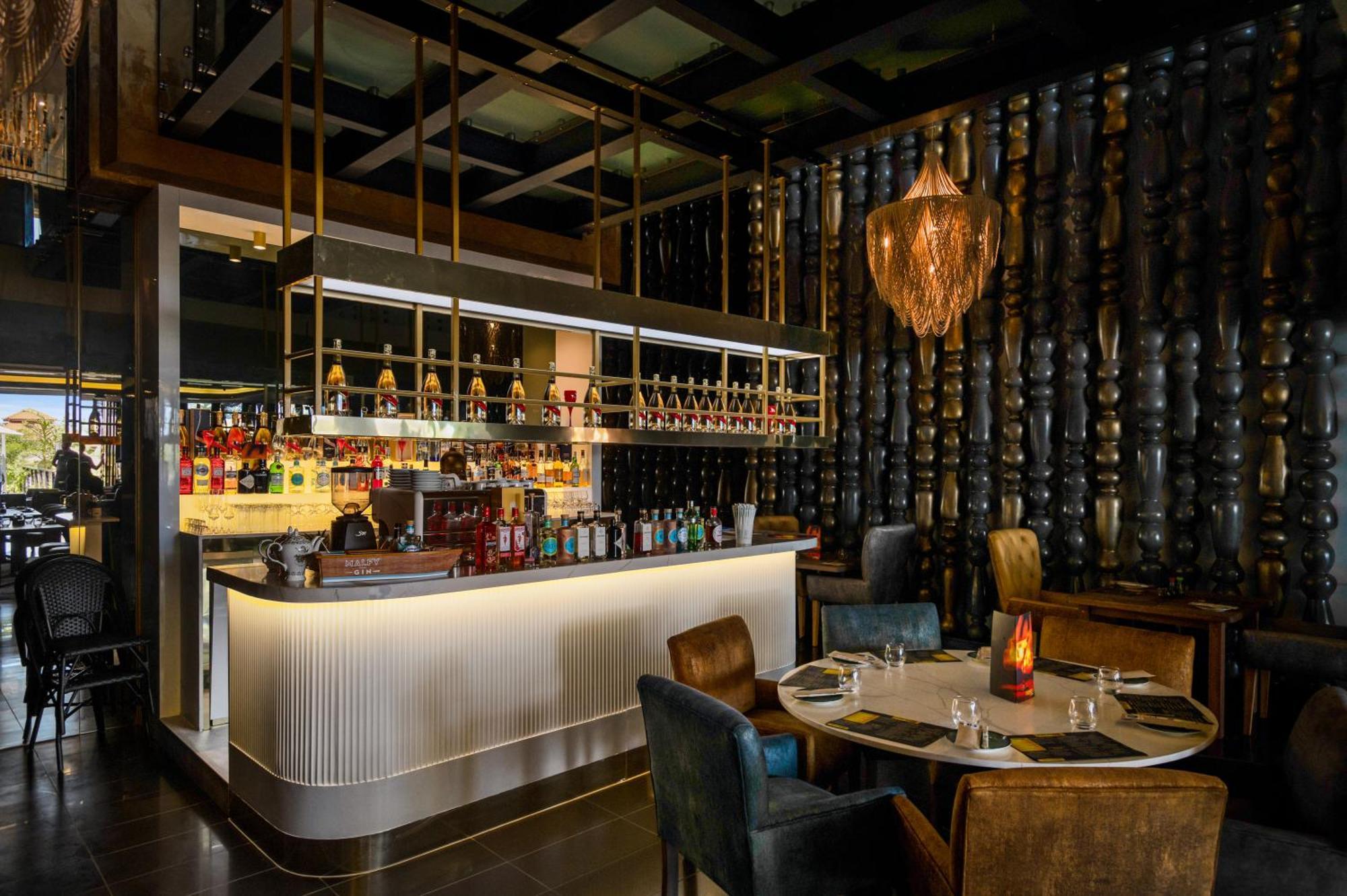 The Capital Zimbali Hotel Ballito Exterior photo The bar at the restaurant